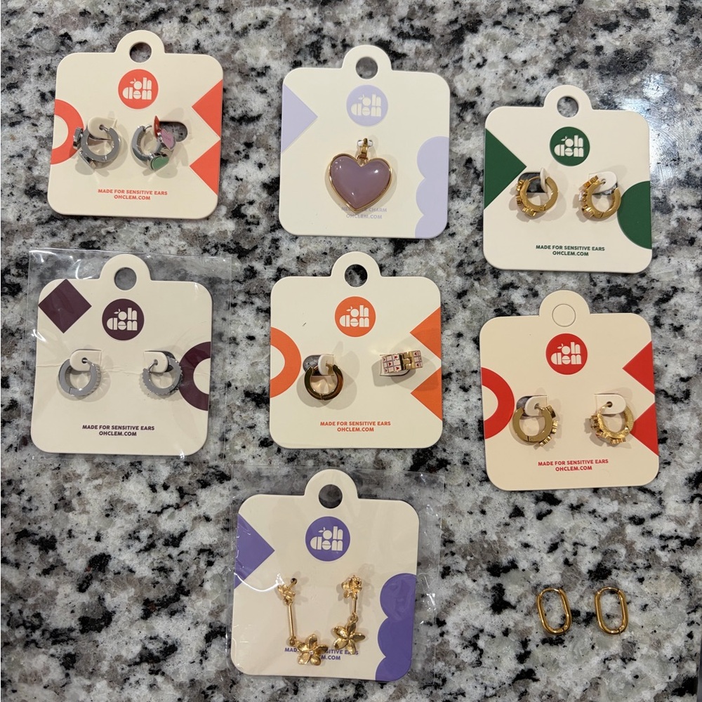 Oh clem set of 7 earring pairs and 1 necklace charm
